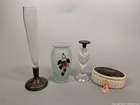 Full group photo showing all four items: bud vase, frosted glass vase with silver leaf, crystal perfume bottle, and silver vanity box