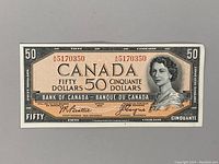 Front side of the 1954 Canadian $50 bill showing the portrait of Queen Elizabeth II, denomination, and signatures.