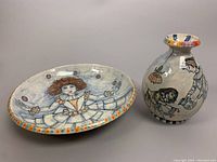 Photo showing 8 inch vase and 13 inch bowl side by side with detailed painted figures and colorful rim pattern.