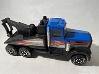 Blue Tonka Big Tow truck side view showing overall condition and detail.