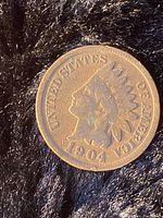 1904 Indian Head penny obverse showing the profile of an Indian head and the date 1904.