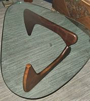 Overhead view showing full glass top and wooden base design