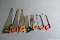 Photo showing seven assorted saws for wood and metal in various sizes.