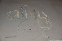 Six assorted power bars laid out on a flat surface showing various lengths and outlet configurations.