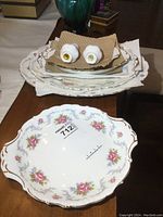 Large white china platter with pink rose floral pattern and gold trim, marked Royal Albert