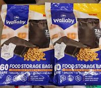 Packages of Wallaby brand food storage bags, each containing 60 one-gallon 7.5 mil thick stand-up zipper bags in matte black.