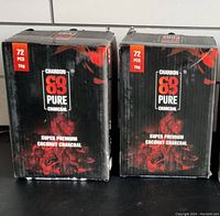 Two unopened boxes of Charbon 69 Pure charcoal, each box containing 72 pcs of super premium coconut charcoal, 1 kg each.