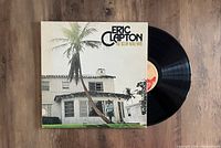 Front view of the LP record sleeve with the vinyl partially visible, showing the album cover artwork and vinyl label.