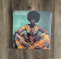 Front cover of Madeline Bell 'Doin' Things' vinyl record showing album art and artist.