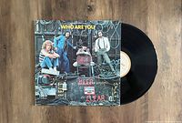 Front cover of The Who 'Who Are You' vinyl LP, showing band members and album title with wires background.