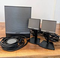 Overall set of Bose Companion 3 speaker system with subwoofer, two satellite speakers on stands, volume control pod and cords.