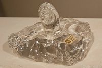 Top angle showing the polar bear figure on faceted crystal rock base with Hadeland Crystal sticker visible.