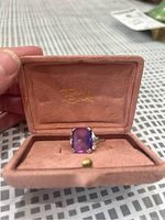 Ring set in open pink suede Birks box showing interior logo and clasp