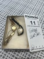 Two vintage ladies wrist watches in presentation box with MaxSold card