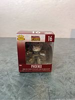 Front view of the unopened Phoenix Funko Pop Minis box showing figure and box design.
