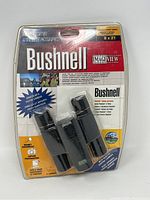 Front view of new packaged Bushnell ImageView binocular and digital camera combo showing branding, product features, and clear plastic protective package.