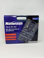 Mastercraft Tap & Die Set original packaging box showing brand and set details including 76 pieces, alloy steel construction, lifetime warranty.