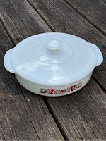 Photo of the covered casserole dish showing the lid, floral pattern visible on the side.