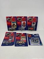 Front view of six vintage 1998 Winners Circle NASCAR 1:64 scale die cast cars in original packaging, arranged in two rows of three items each