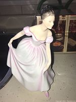 Front angled view of the Royal Doulton Danielle figurine showing the facial features and dress details.