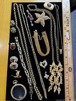 Full layout of jewellery lot on black background