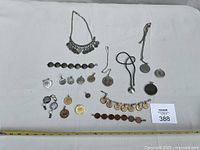 Overview of all coin jewellery pieces laid out