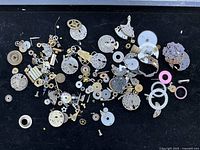 Wide shot of entire assortment spread on black surface