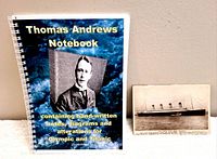 Photo of Thomas Andrews Notebook with cover showing portrait and title, alongside antique Olympic postcard
