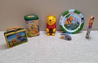 Full view of all six Winnie The Pooh items arranged on the floor