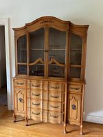 Front view of full china cabinet hutch showing upper display and lower storage sections