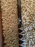 Close-up photo of Fenwick Lunker Stik rod showing brown color and thread wrapping details