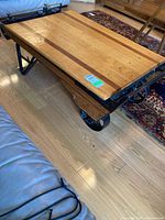 Full view of table top and cast iron wheel base