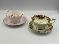 Overview of both teacup and saucer sets side by side