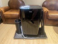 Front view of Danby portable air conditioner with attached exhaust hose and window kit