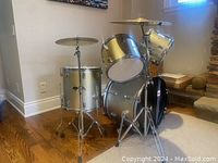 Front view of full five-piece kit showing drums and cymbals