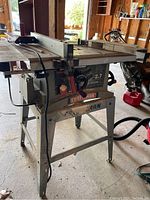 Front angle view of the Craftsman table saw showing the control panel, fence, and table top