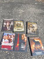 Photo showing all six DVDs: The Hobbit, two Lord of the Rings movies, Old School Unrated, From Hell, and Batman Begins.