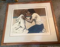 Frontal view of framed lithograph showing entire artwork, frame, and matting.