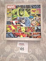 Closed box with Marvel comic cover style artwork featuring Hulk, Captain America, Thor, and Iron Man illustration on front. The box shows 'Four specially crafted soap bars' and Dr. Squatch branding.