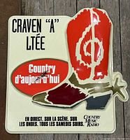 Full view of vintage Craven 'A' Ltée advertising wall clock with country music theme and branding.