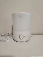 Front view of ASAKUKI diffuser with power cord attached