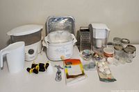 Full lot overview showing all appliances, kitchen tools, jars and accessories