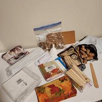 overview of corks, napkins, craft sticks, funnel, cork sheet