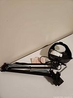 Folded spring-arm assembly, clamp base, lamp head with magnifier and LED bulb