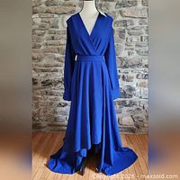 Front view of royal blue wrap dress on mannequin