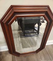 Front view of octagonal mirror showing full frame and glass