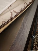 Close view of twin boxspring edge and fabric trim