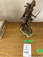 Front view showing Diana standing with spear and dog beside her on onyx base