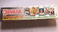 Photo of the 1991 Donruss baseball collector set box showing branding and description of included cards and puzzles.