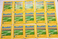 Fifteen yellow factory sealed packs of 1994 Panini MLB baseball collectible stickers, each pack containing 6 album stickers, laid out flat.